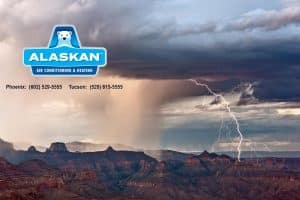 Lightning Strike over the desert with Alaskan AC logo and contact info
